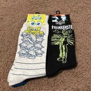 NWT Men Novelty Socks. Four pairs of socks- 2 Nickelodeon and 2 Universal socks.